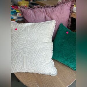 Decorative pillows. Two oversized. One regular.
